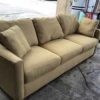 Beige Couch with Matching Pillows